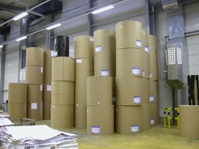 big rolls of paper primer for printing in storage room